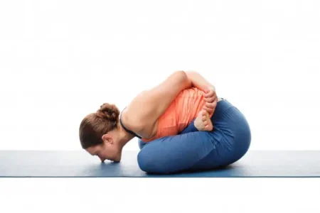 Woman Doing Asana Yoga Mudrasana