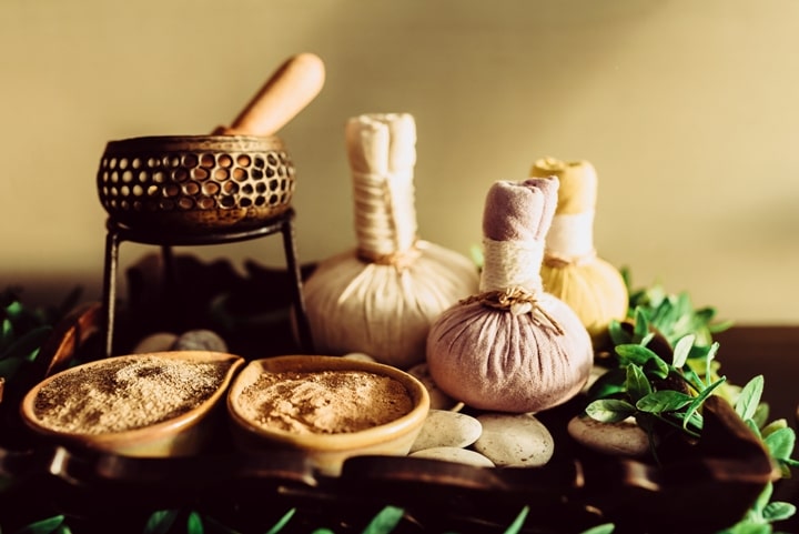 herbs-powder-traditional-spa-wooden-background